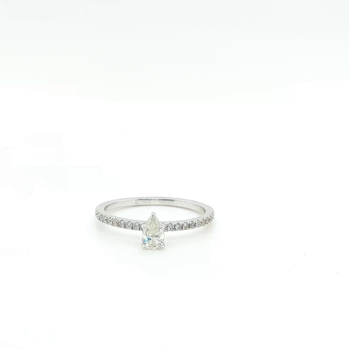 Pear-Shaped Brilliant-Cut Diamond Engagement Ring in White Gold Pave Band