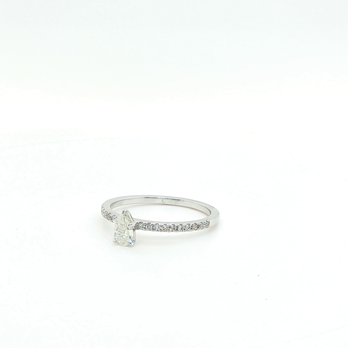 Pear-Shaped Brilliant-Cut Diamond Engagement Ring in White Gold Pave Band