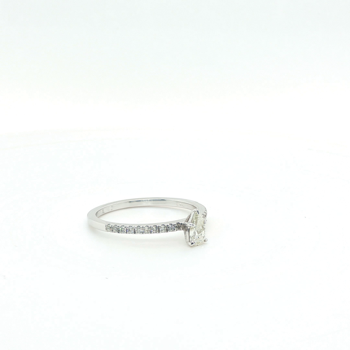 Pear-Shaped Brilliant-Cut Diamond Engagement Ring in White Gold Pave Band