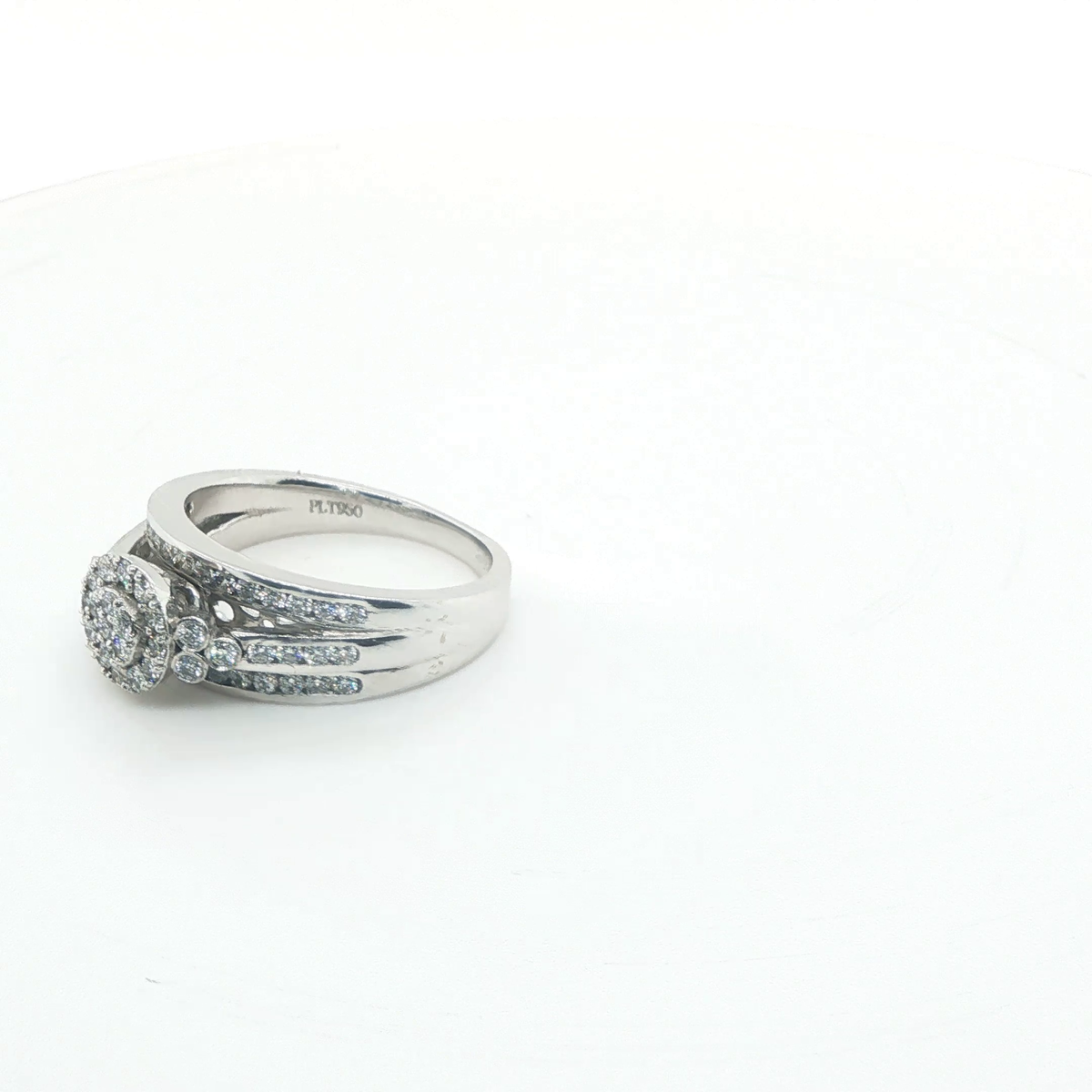 Round Brilliant Diamond Platinum Three-Stone Anniversary Ring with Pave Accents