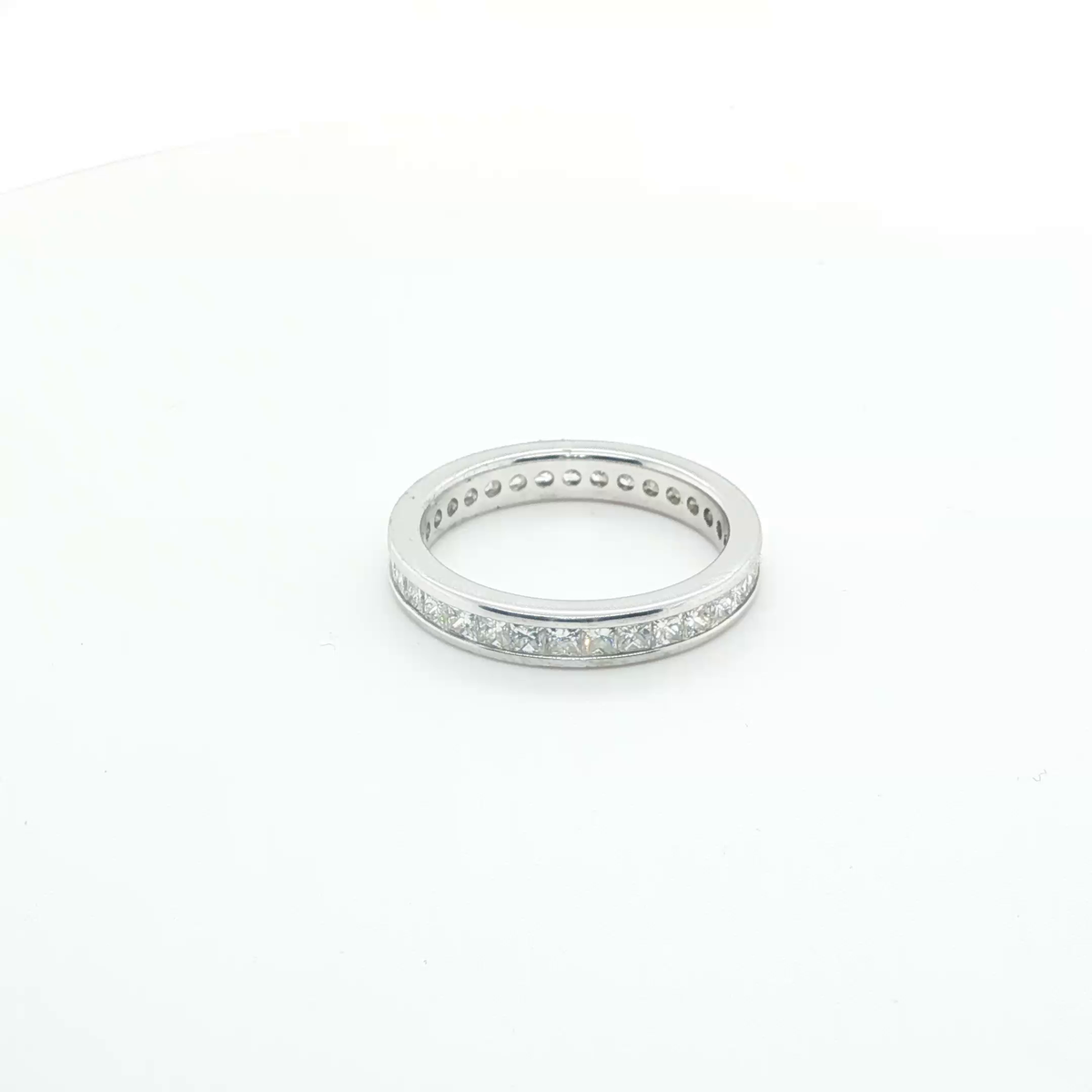 Princess Cut Diamond Channel Set Eternity Ring in White Gold