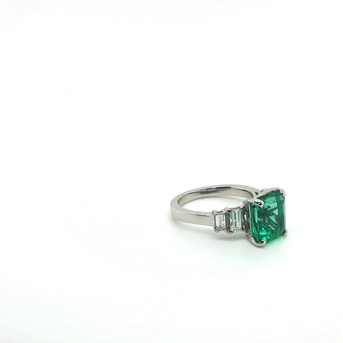 Classic White Gold Emerald-Cut Emerald and Diamond Halo Multi-Stone Ring