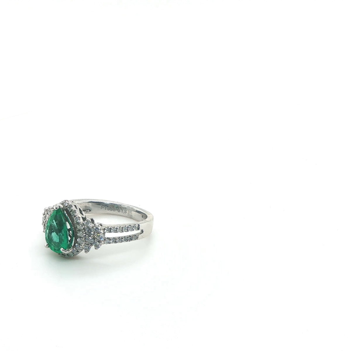 Elegant Pear Cut Emerald Solitaire Cocktail Ring in Polished Platinum