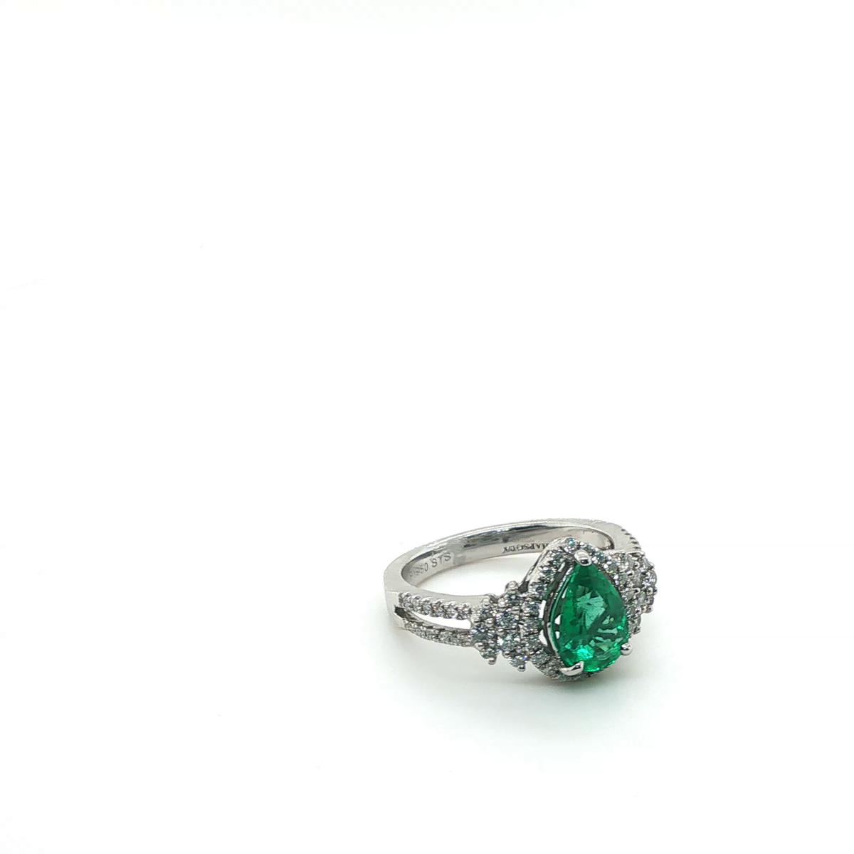 Elegant Pear Cut Emerald Solitaire Cocktail Ring in Polished Platinum