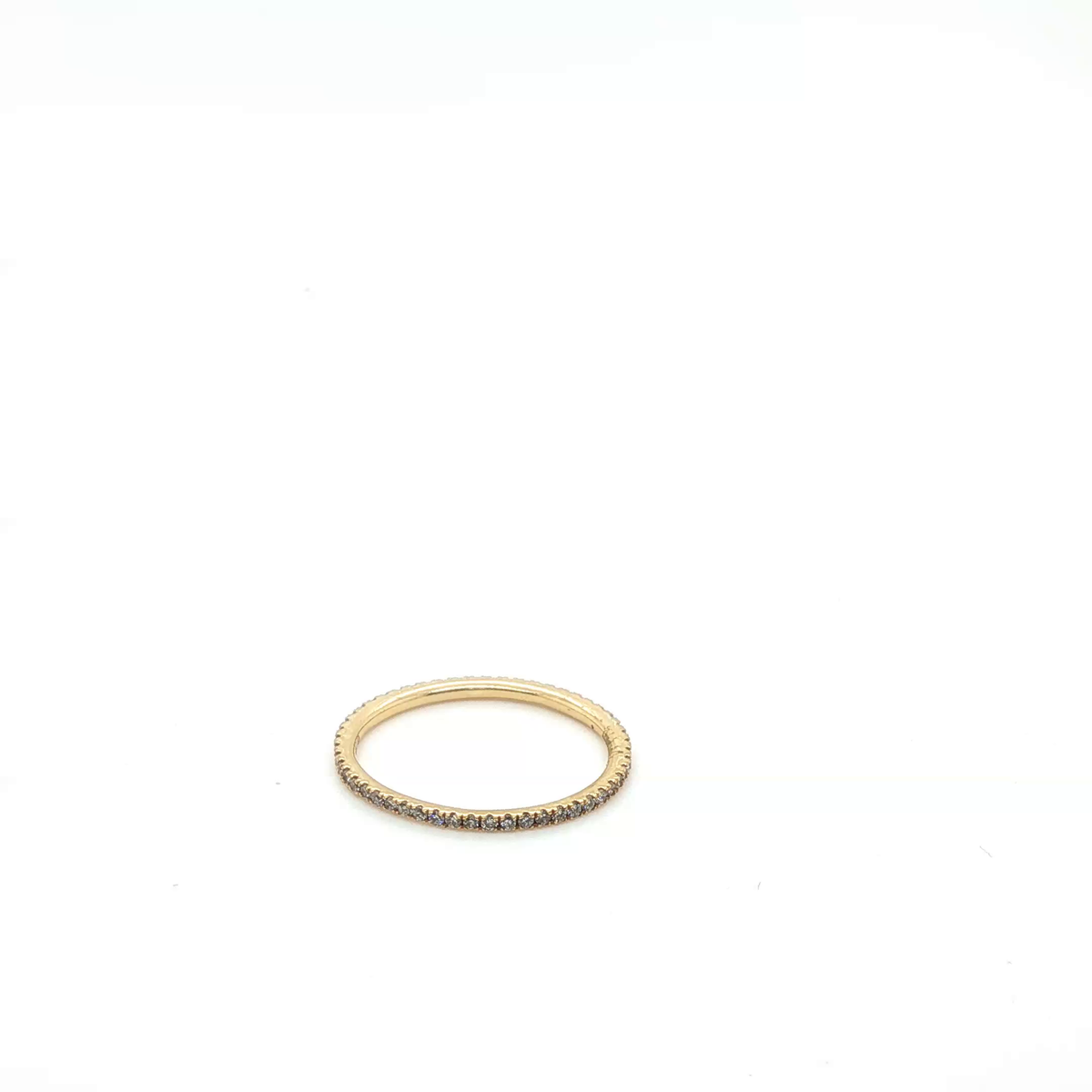 Round Brilliant Cut Diamond Eternity Ring in Yellow Gold
