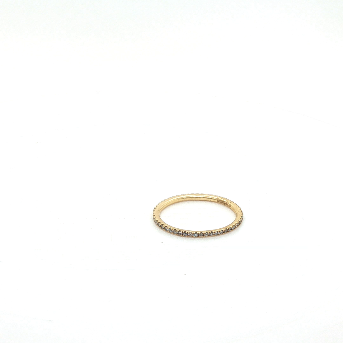 Round Brilliant Cut Diamond Eternity Ring in Yellow Gold