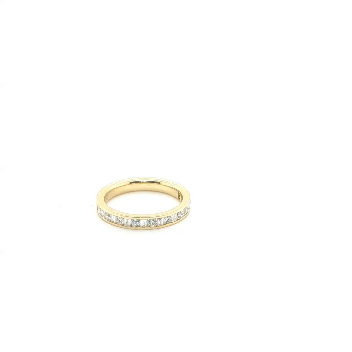 Round Brilliant Cut Diamond Eternity Ring in Yellow Gold