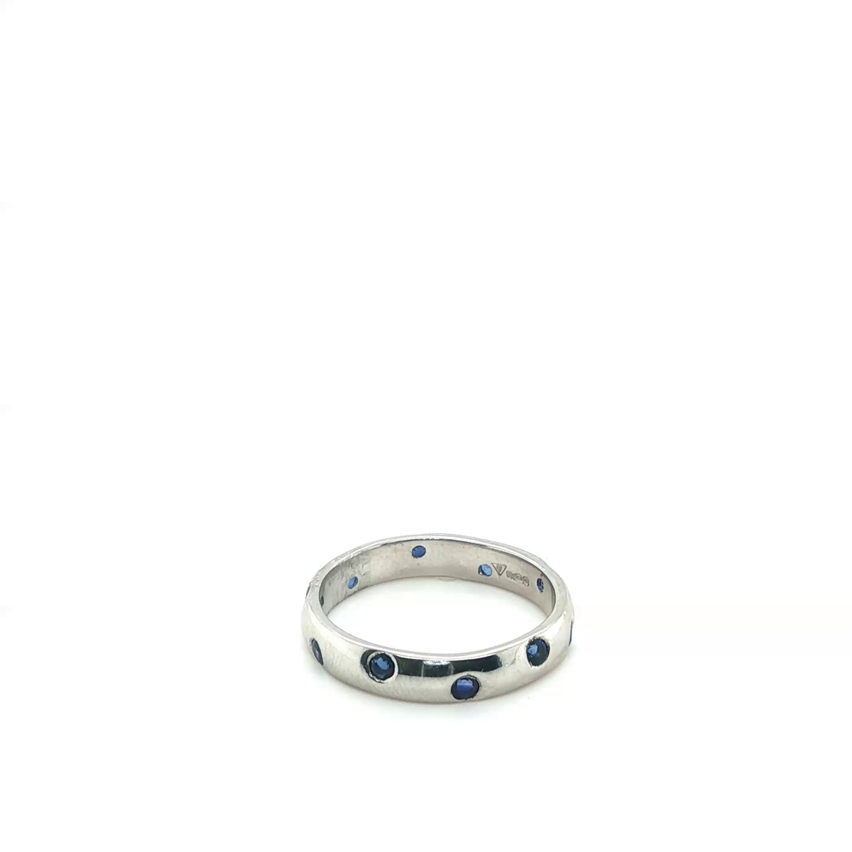 Round Brilliant Cut Blue Sapphire Eternity Ring in Platinum