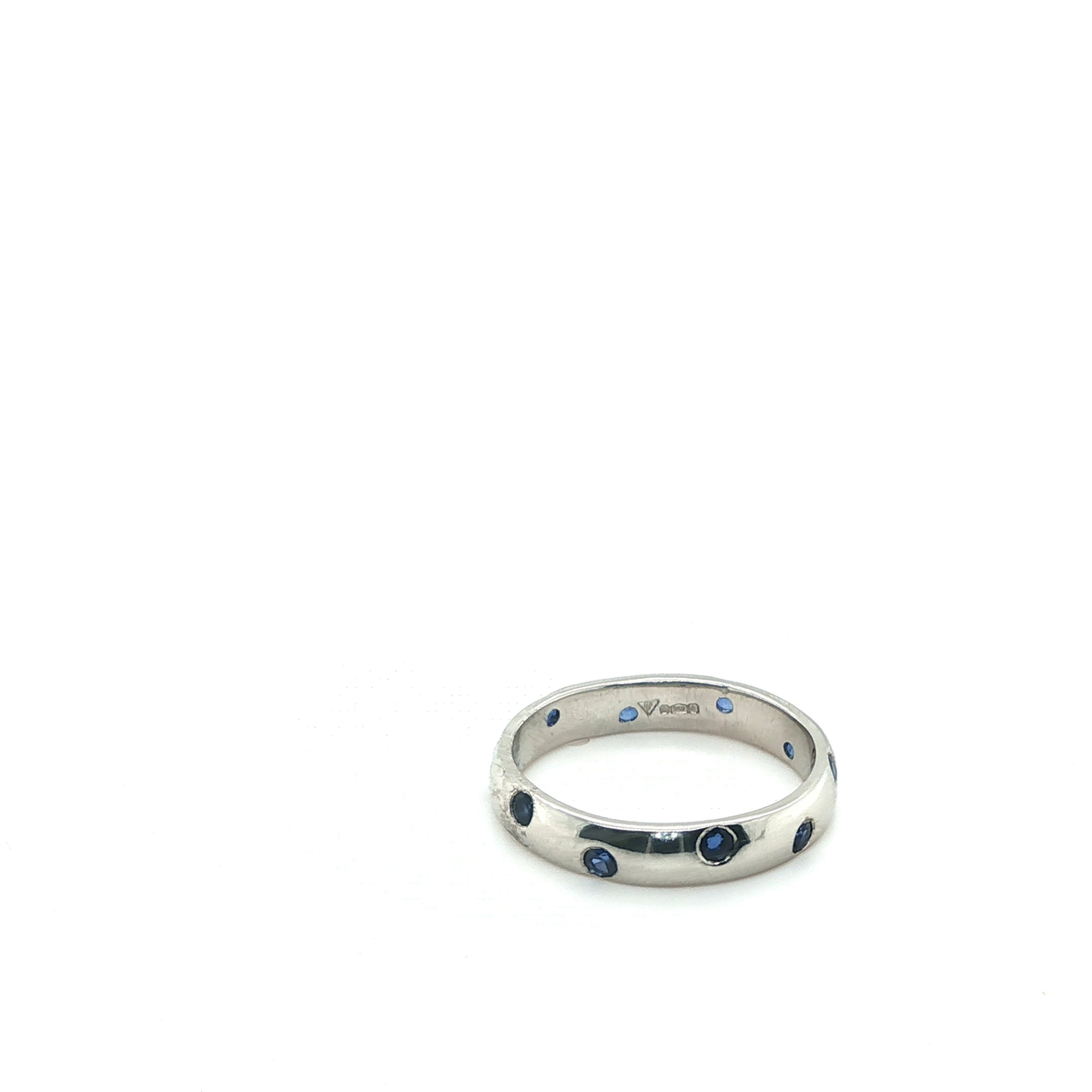 Round Brilliant Cut Blue Sapphire Eternity Ring in Platinum