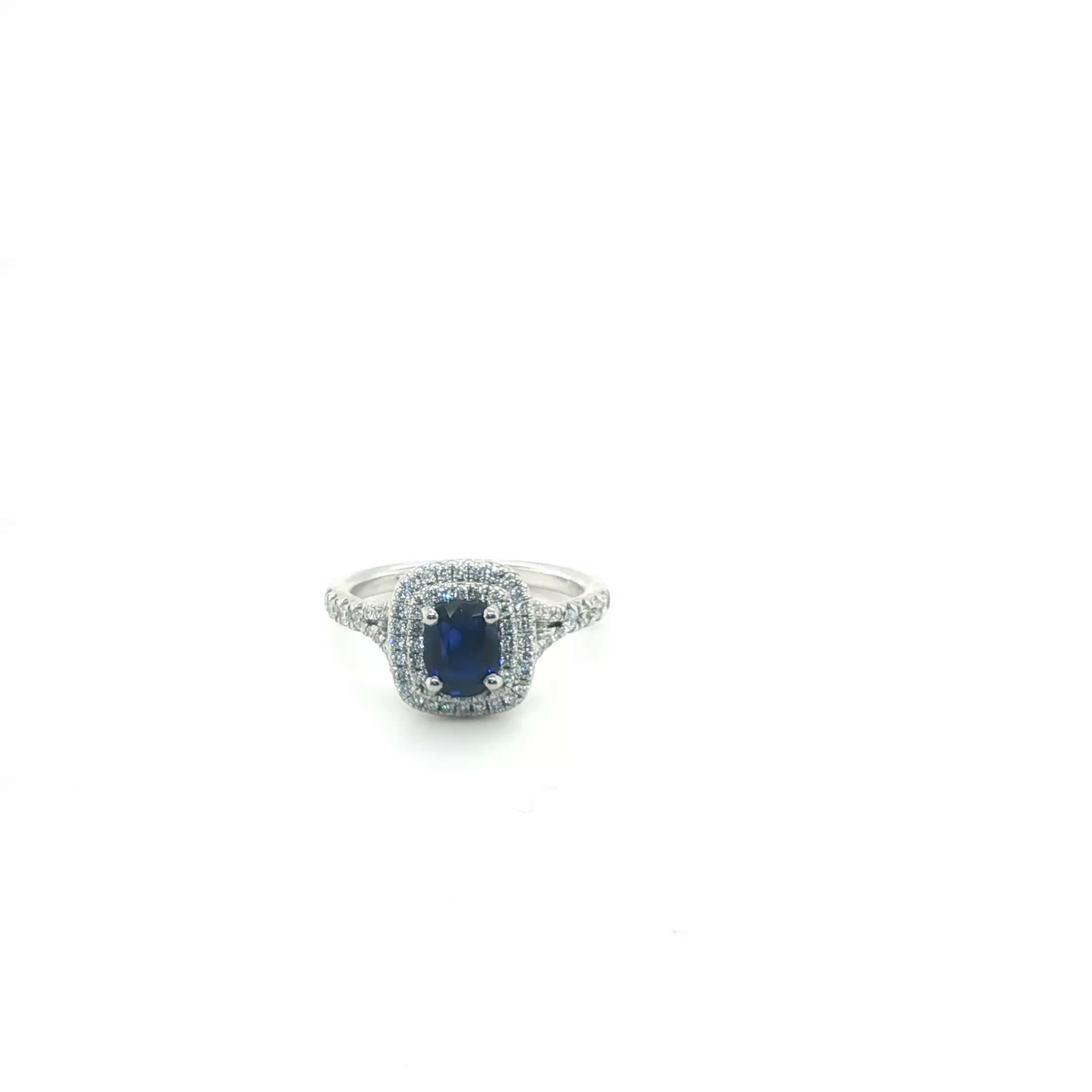 Cushion Cut Royal Blue Sapphire Solitaire Engagement Ring in Platinum