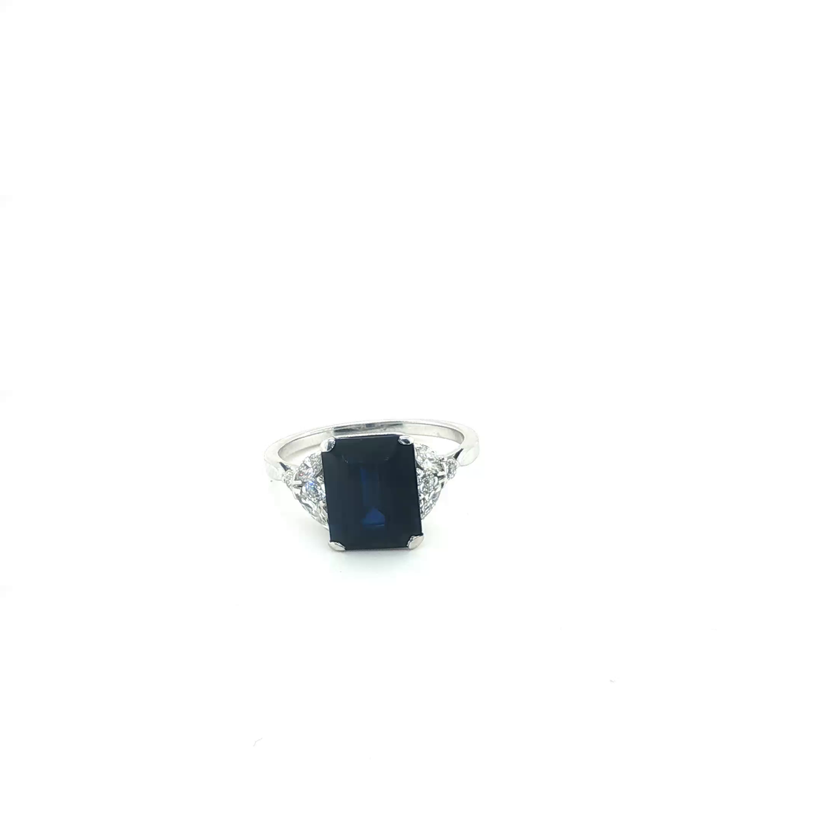 Emerald-Cut Blue Sapphire and Diamond Three-Stone Ring in White Gold