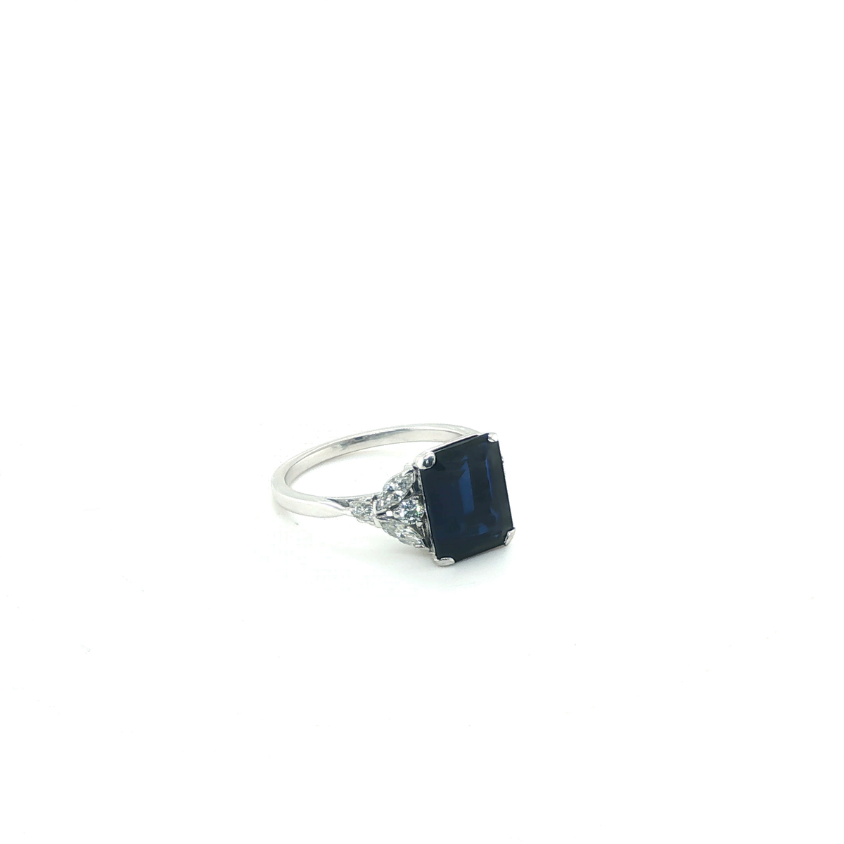 Emerald-Cut Blue Sapphire and Diamond Three-Stone Ring in White Gold