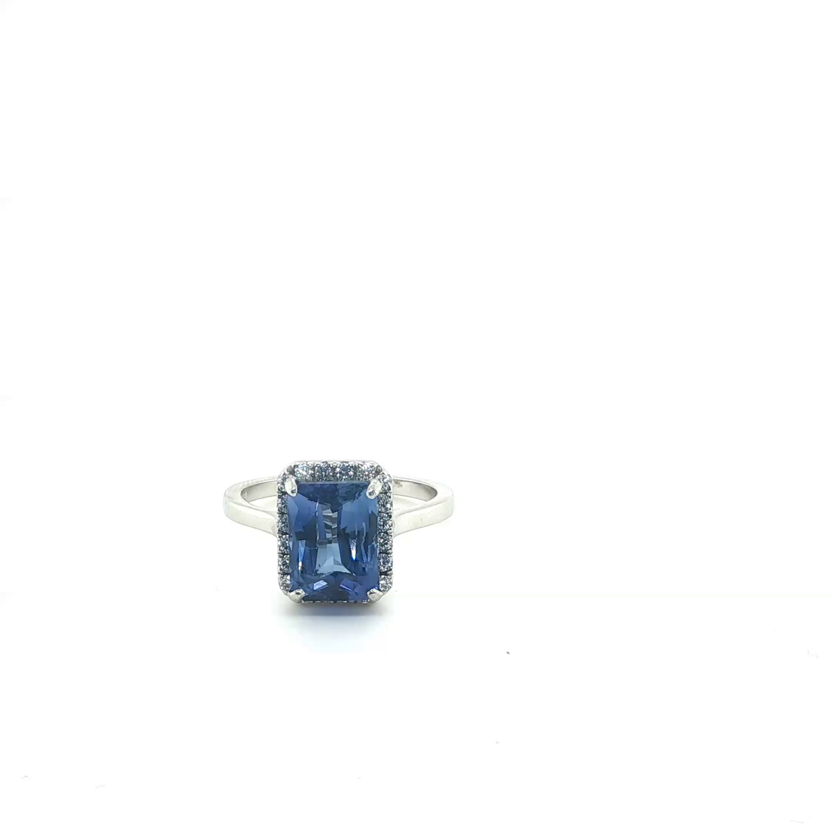 Emerald-Cut Blue Sapphire and Diamond Halo Cocktail Ring in Platinum