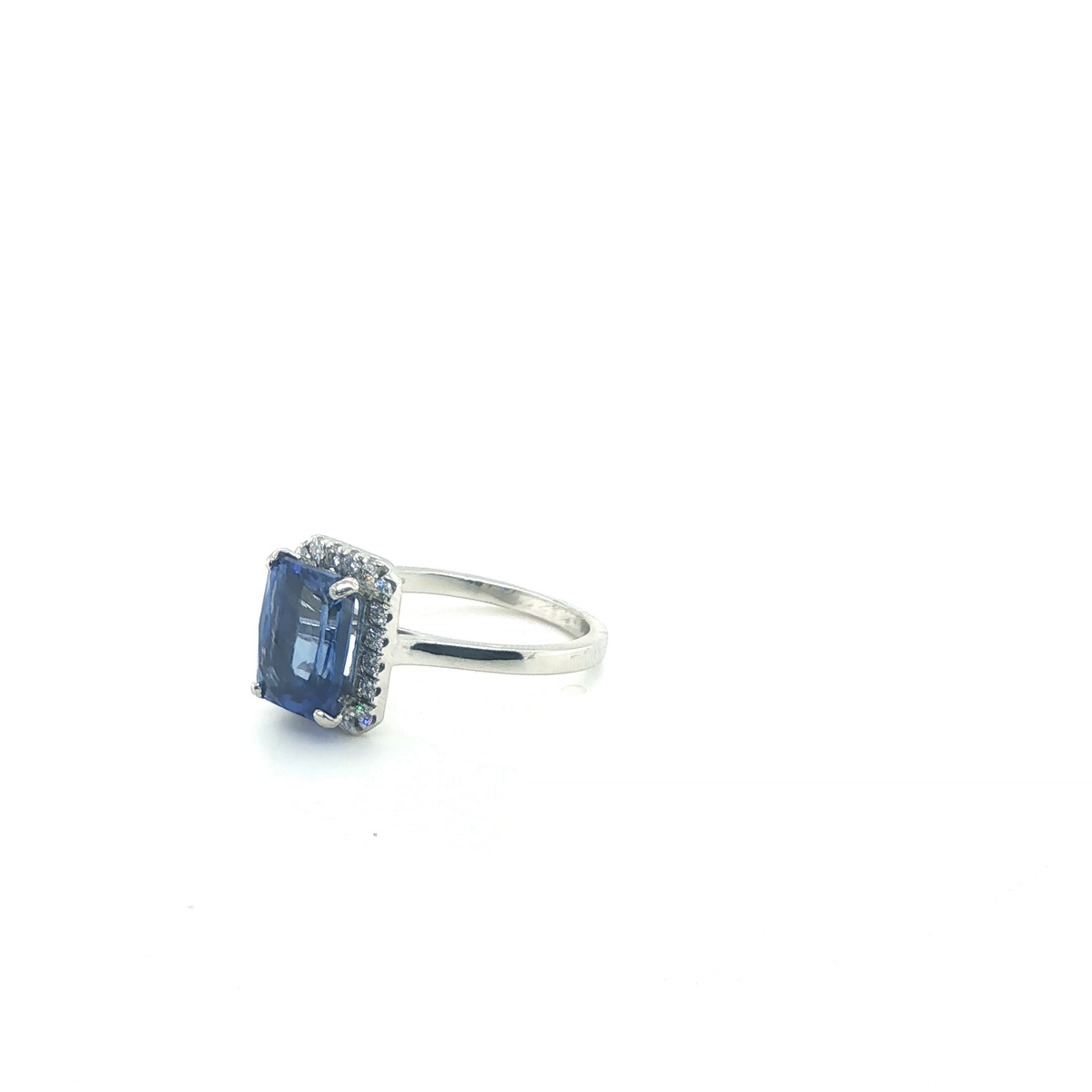 Emerald-Cut Blue Sapphire and Diamond Halo Cocktail Ring in Platinum