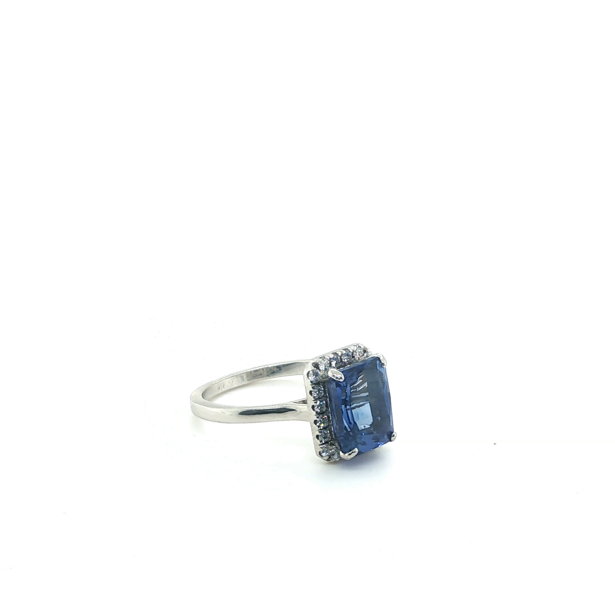 Emerald-Cut Blue Sapphire and Diamond Halo Cocktail Ring in Platinum