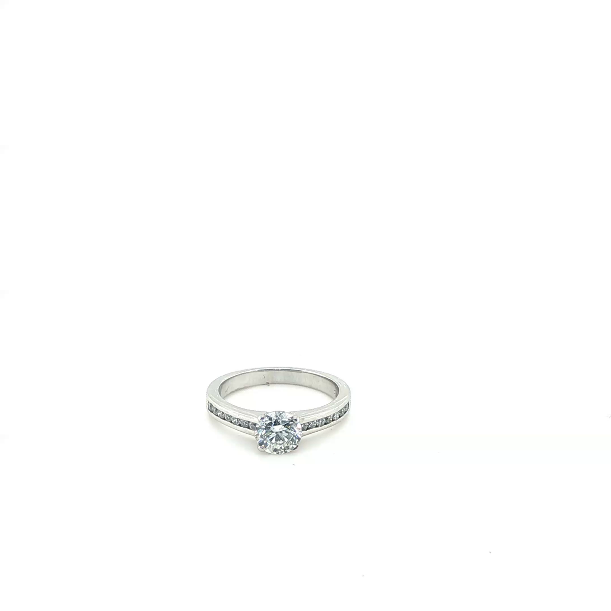 Round Brilliant Diamond Engagement Ring in Channel-Set Platinum
