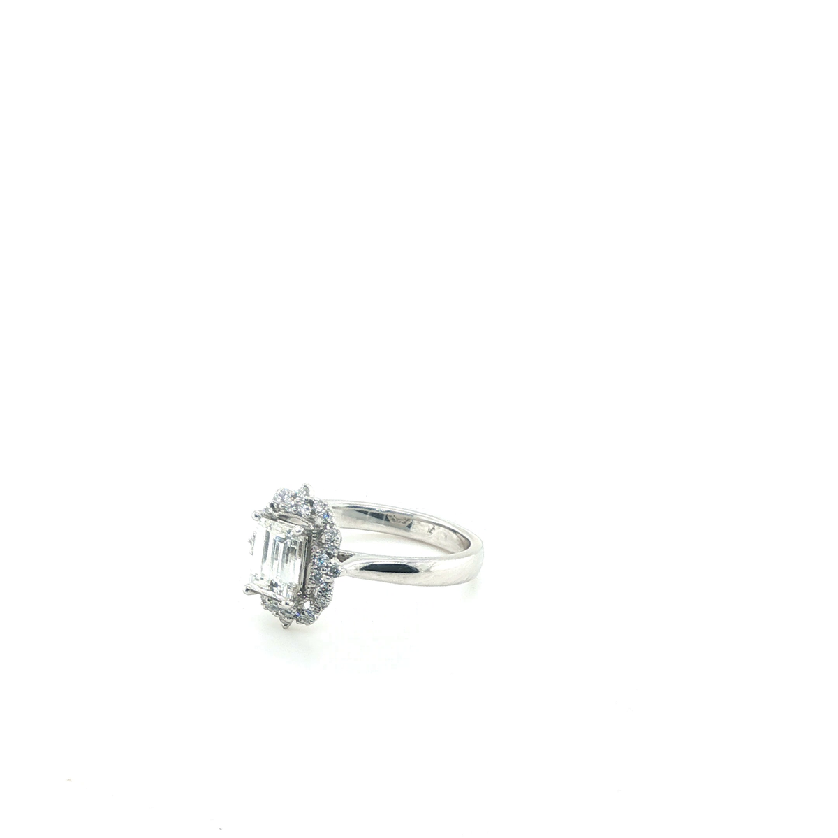 Emerald Cut Diamond Halo Engagement Ring in Platinum