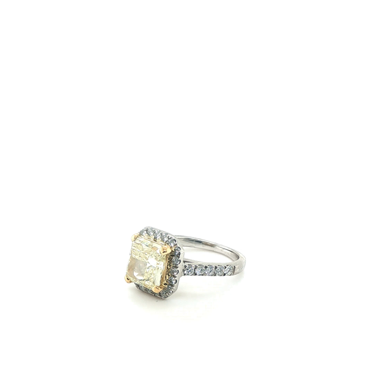 Radiant Fancy Yellow Diamond Halo Engagement Ring in Platinum