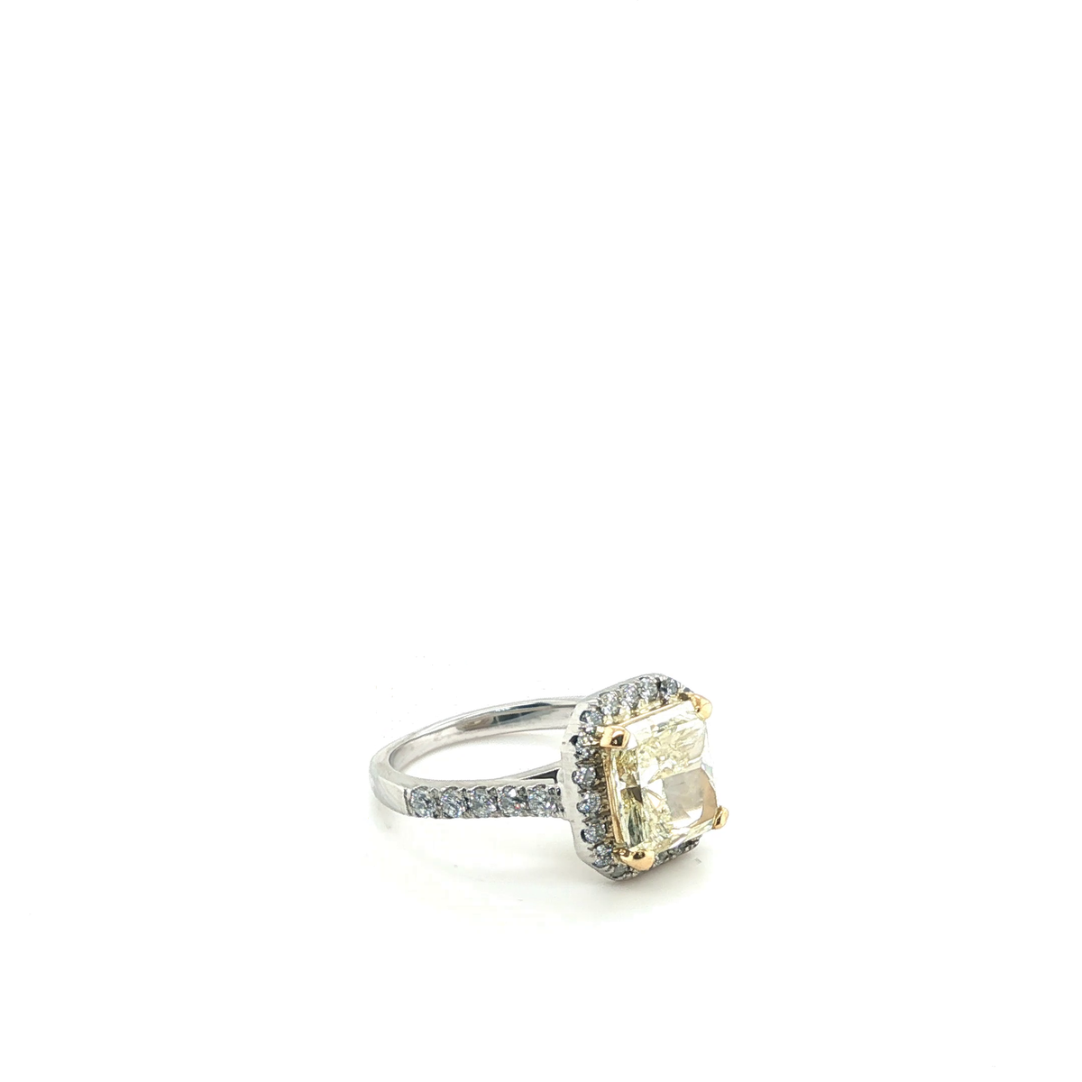 Radiant Fancy Yellow Diamond Halo Engagement Ring in Platinum