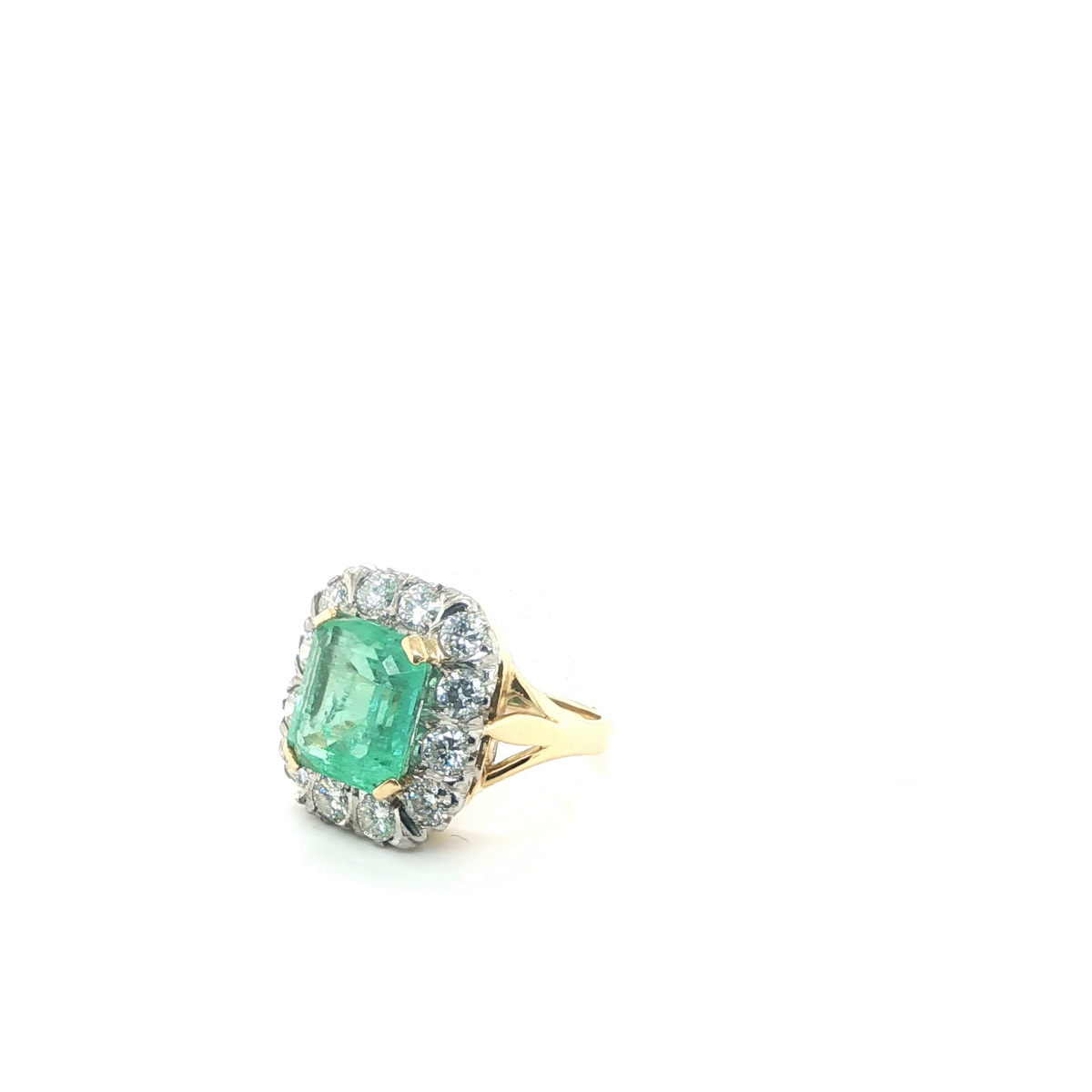 Emerald-Cut Emerald and Diamond Halo Cocktail Ring in Yellow Gold
