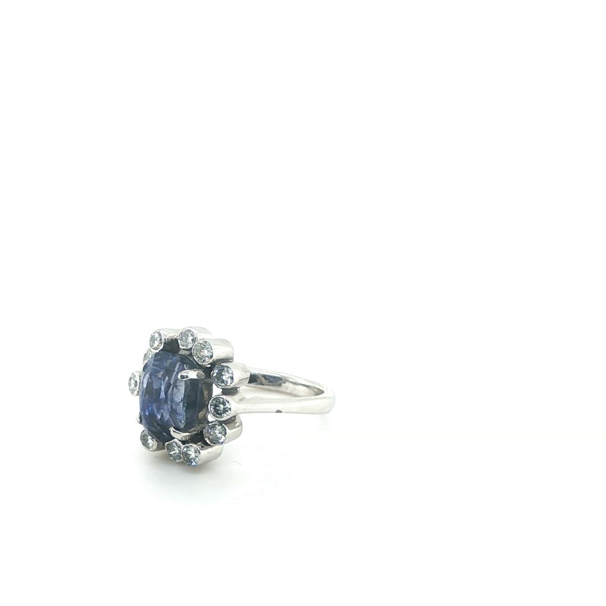 Oval Blue Sapphire and Diamond Floral Halo Cocktail Ring in White Gold