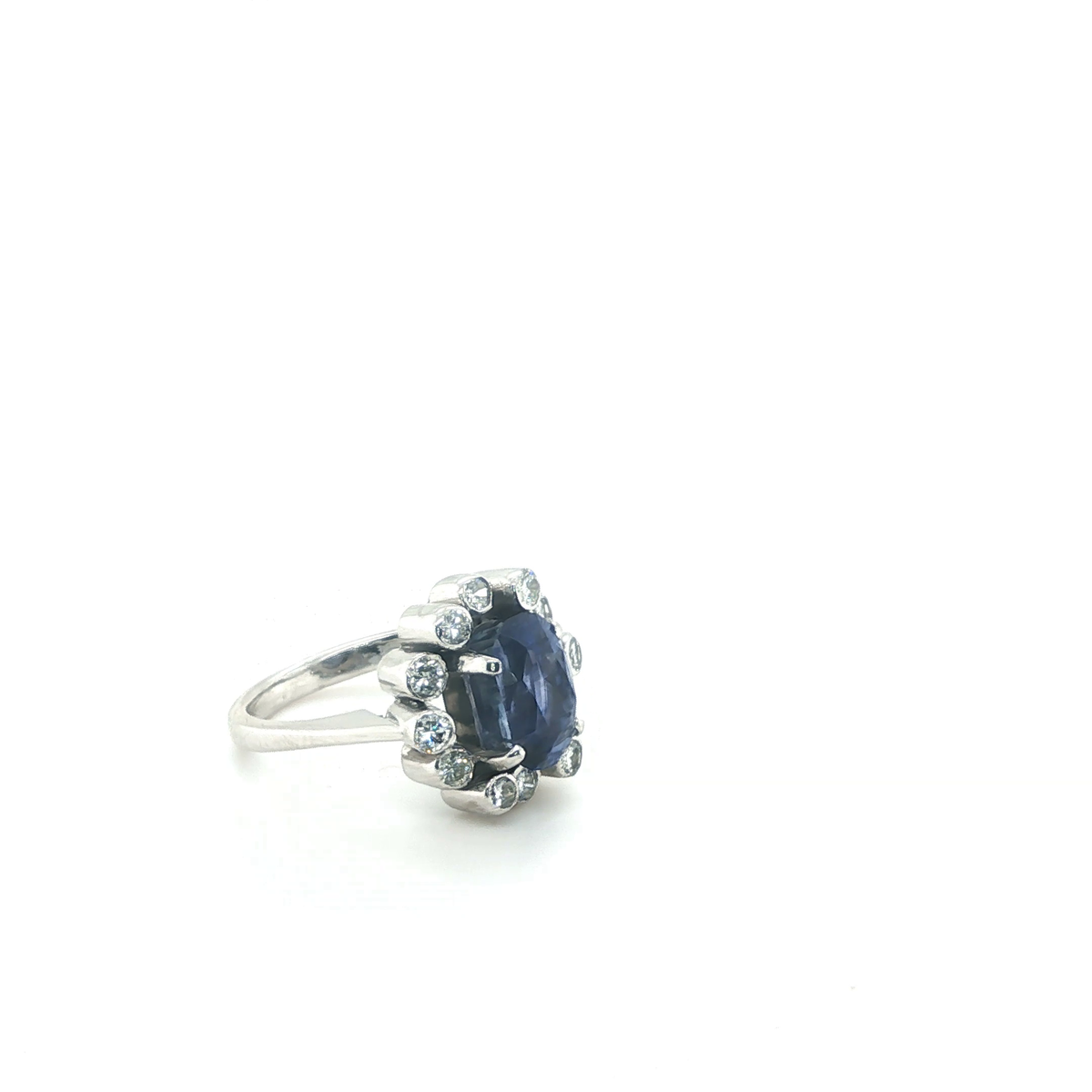 Oval Blue Sapphire and Diamond Floral Halo Cocktail Ring in White Gold