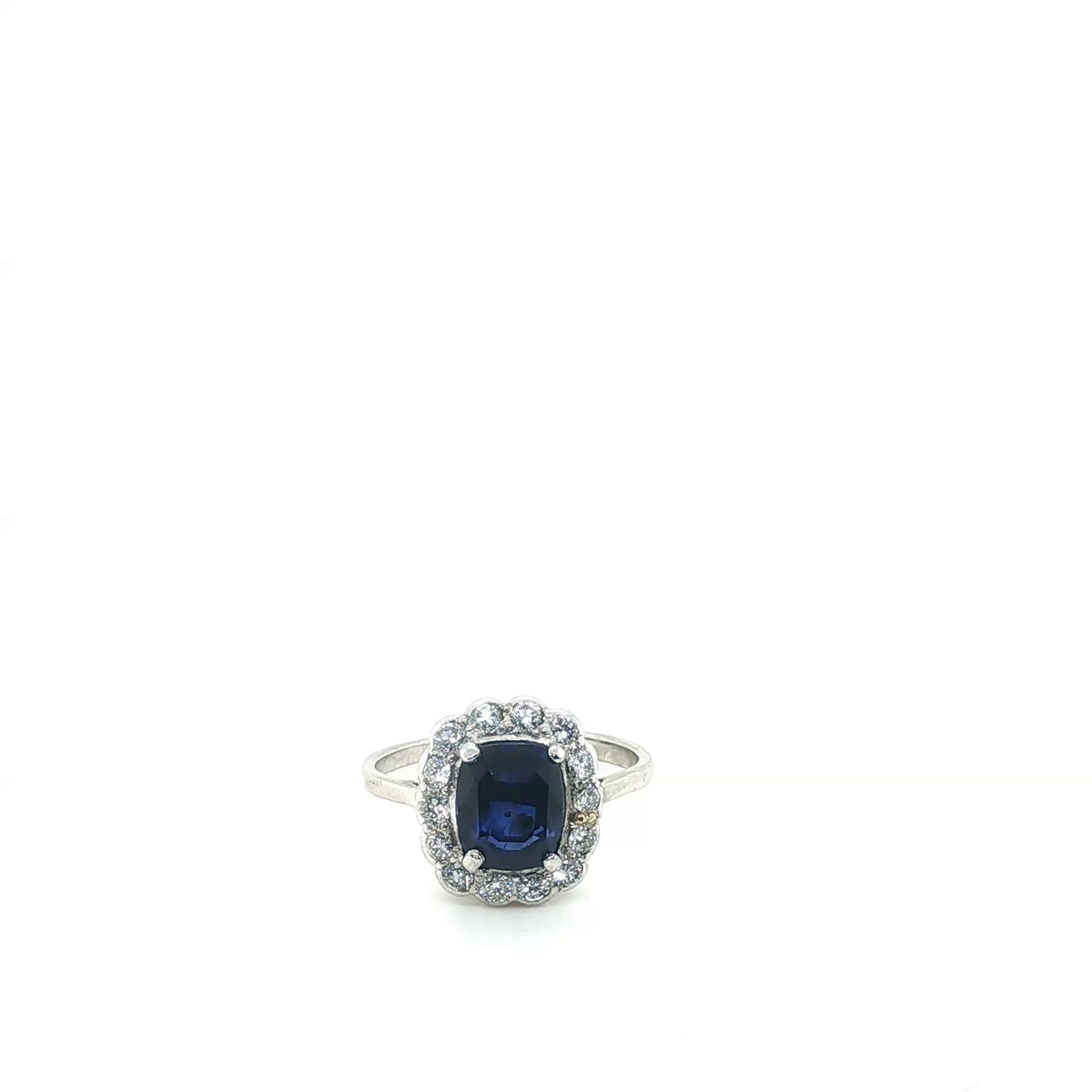 Cushion-Cut Blue Sapphire Scalloped Halo Ring in White Gold