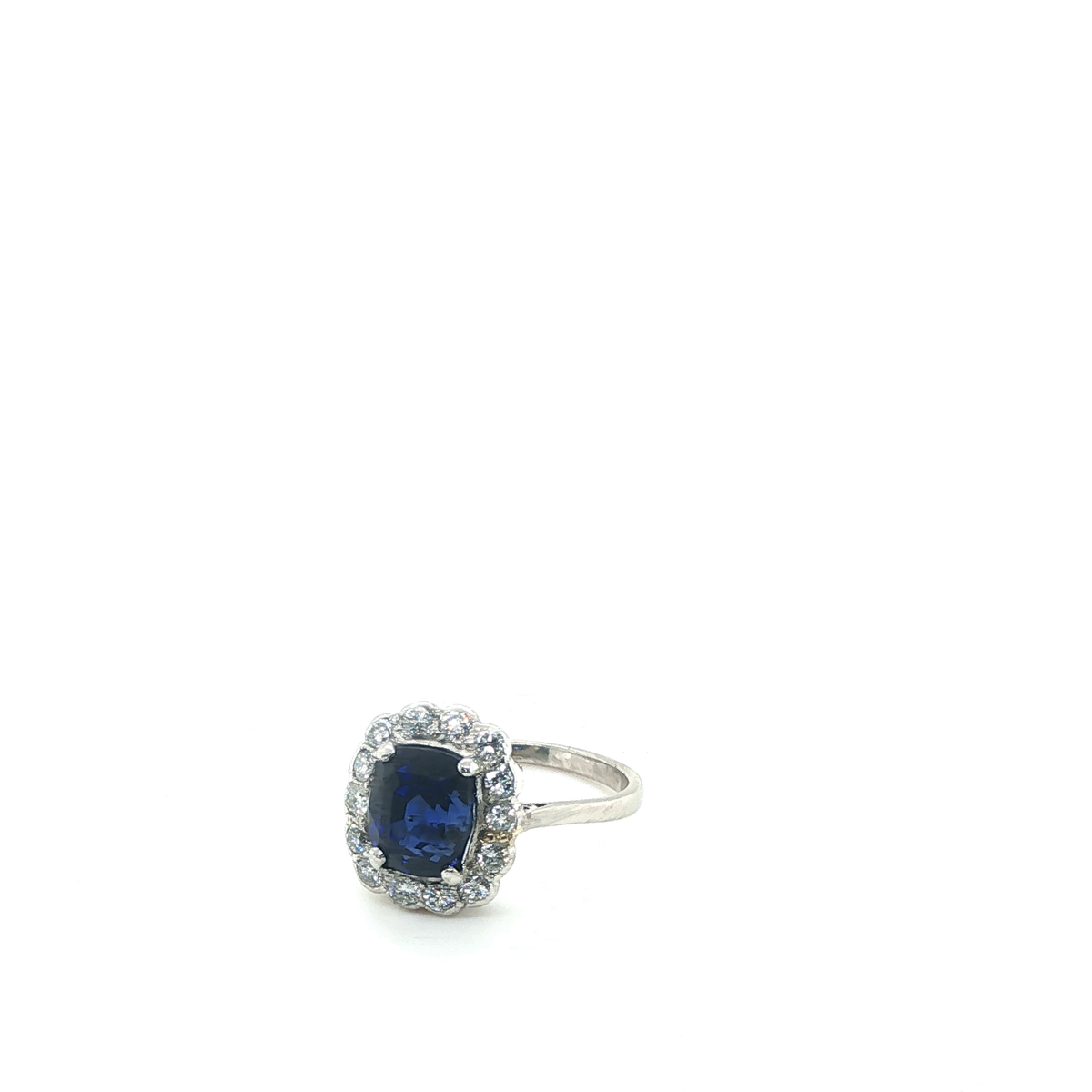 Cushion-Cut Blue Sapphire Scalloped Halo Ring in White Gold
