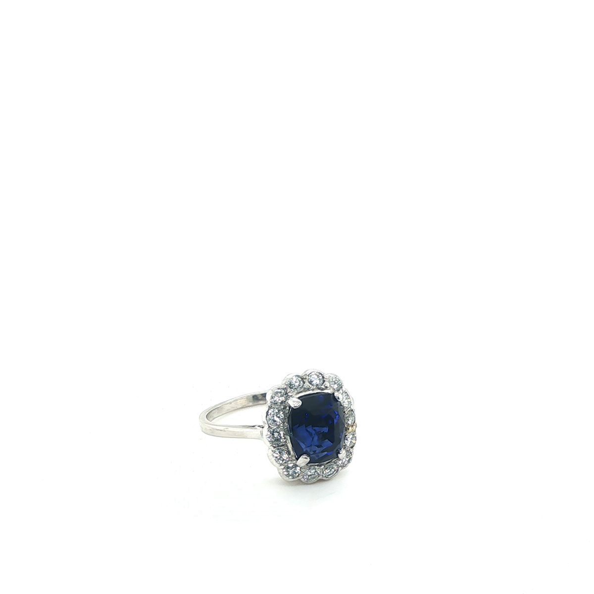 Cushion-Cut Blue Sapphire Scalloped Halo Ring in White Gold