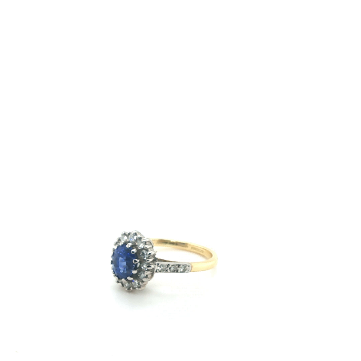 Oval Blue Sapphire and Diamond Cluster Halo Ring in Yellow Gold