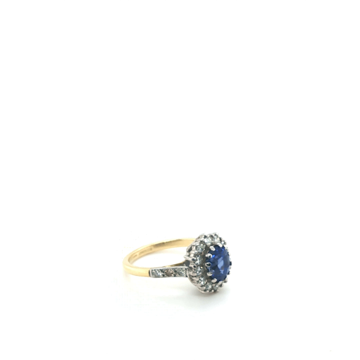 Oval Blue Sapphire and Diamond Cluster Halo Ring in Yellow Gold