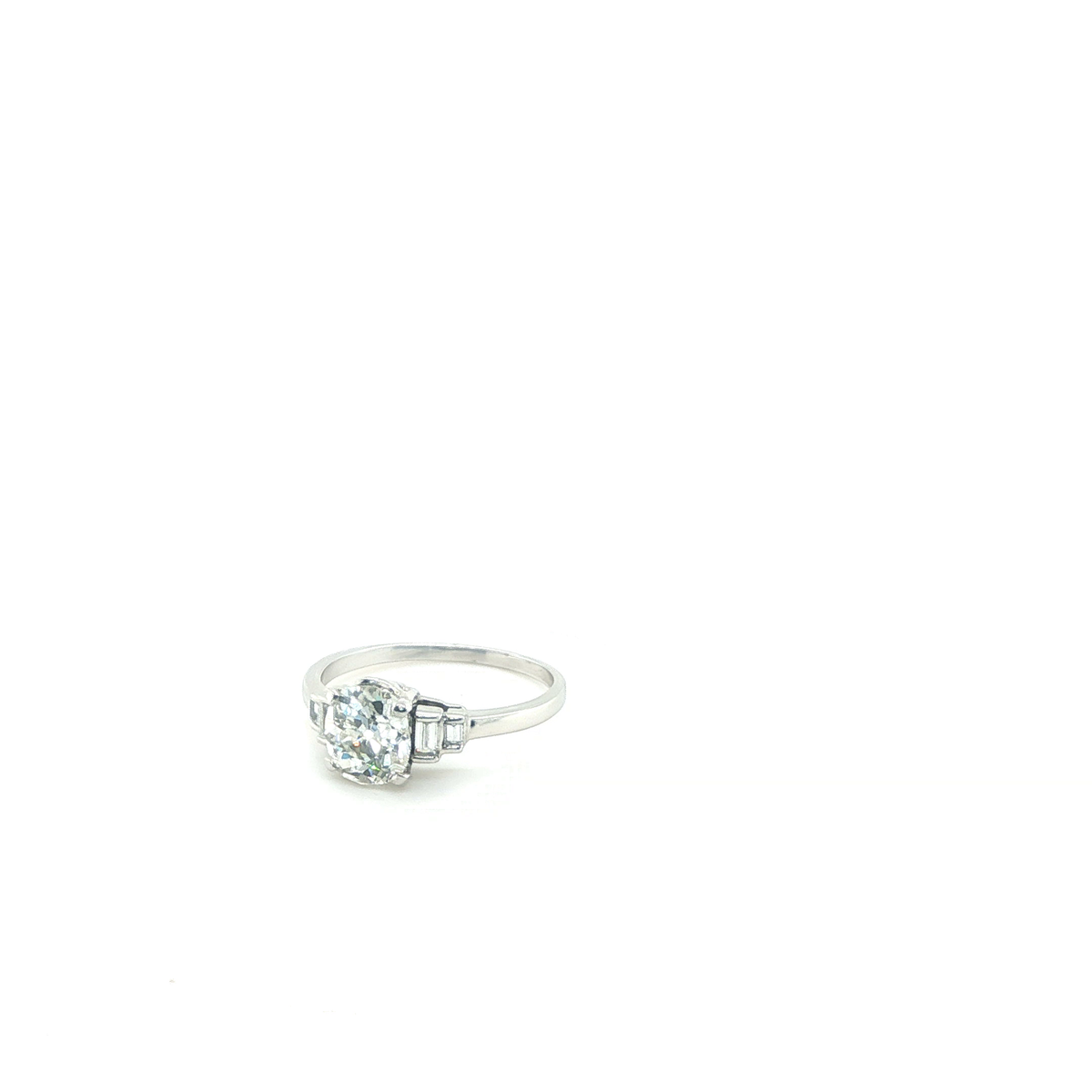 Round Brilliant Diamond Engagement Ring with Baguette Side Stones in White Gold