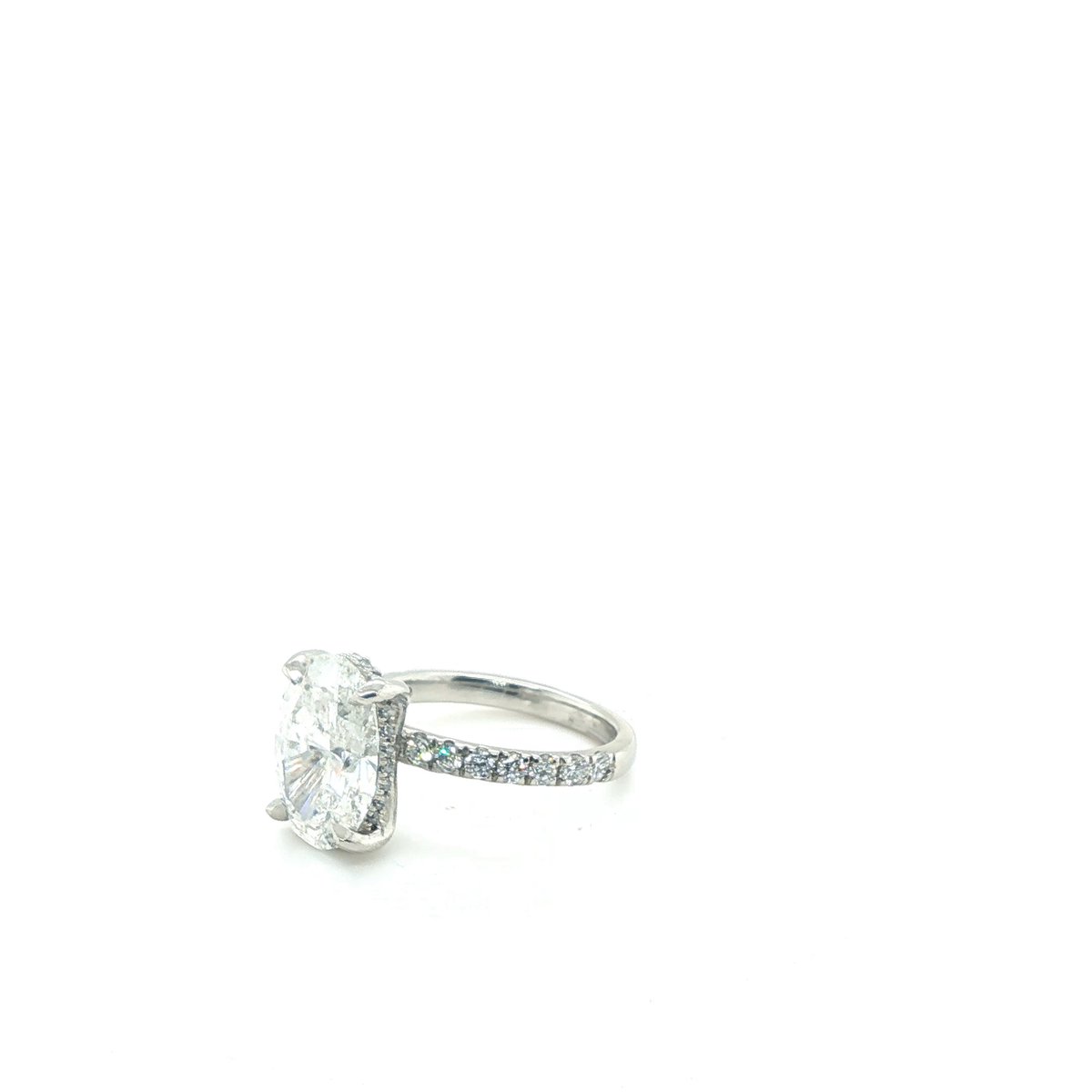 Oval Brilliant Cut Lab-Grown Diamond Solitaire Ring in Platinum with Pavé Band