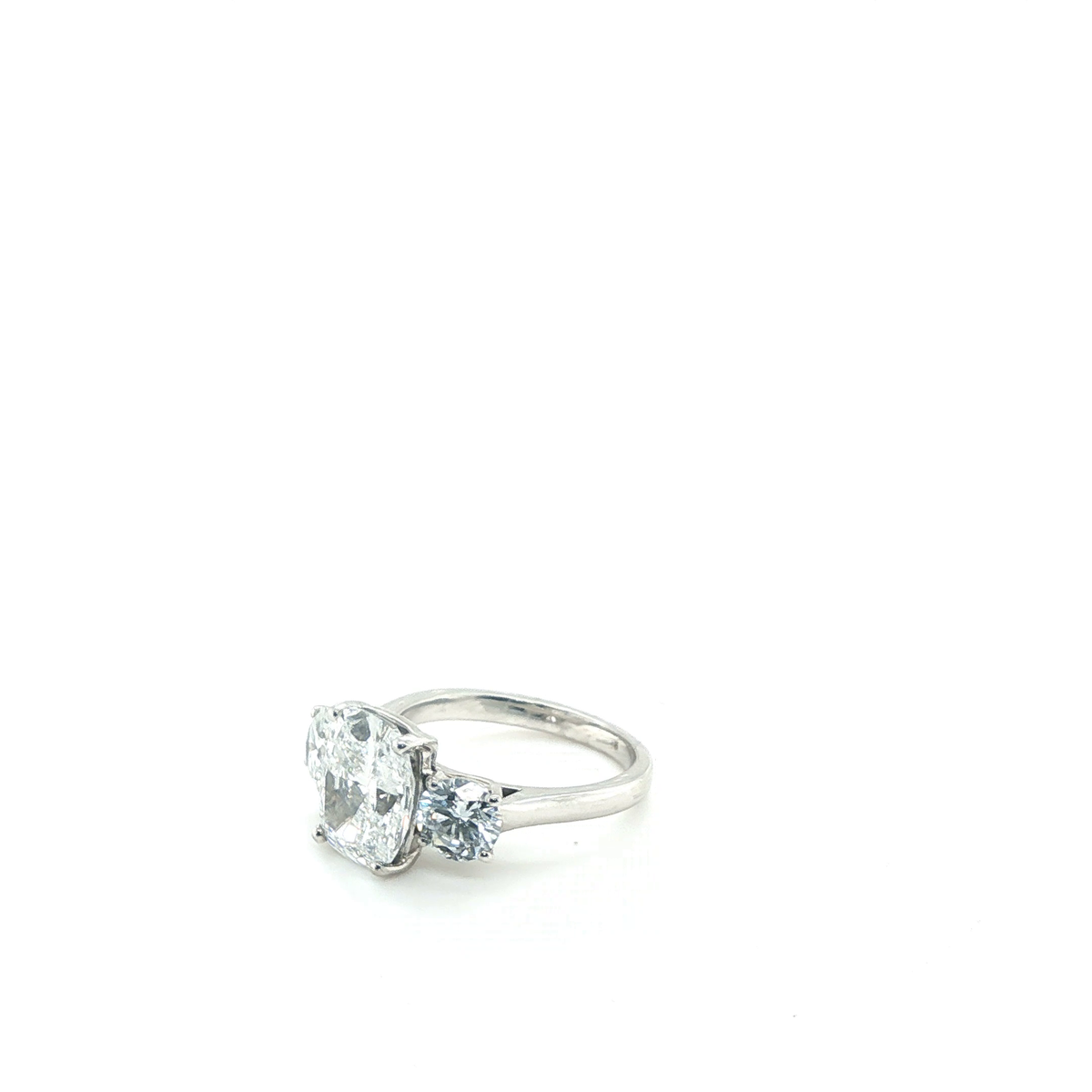 Cushion Cut and Round Brilliant Lab-Grown Diamond Three-Stone Ring in Platinum