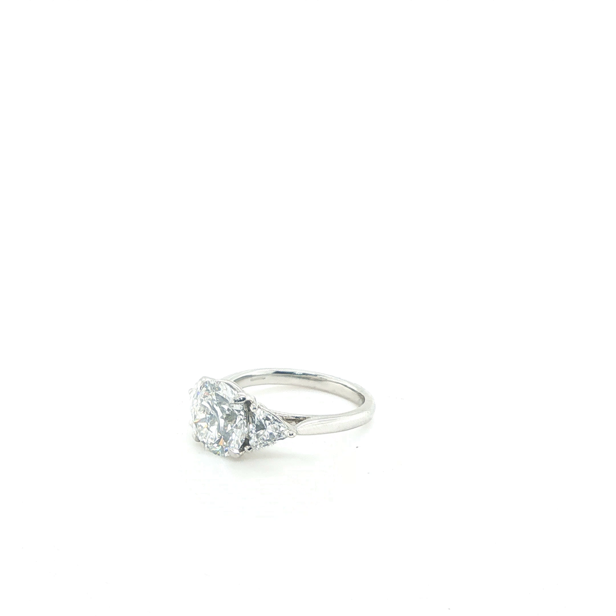 Round Brilliant and Pear Cut Lab-Grown Diamond Trilogy Engagement Ring in Platinum