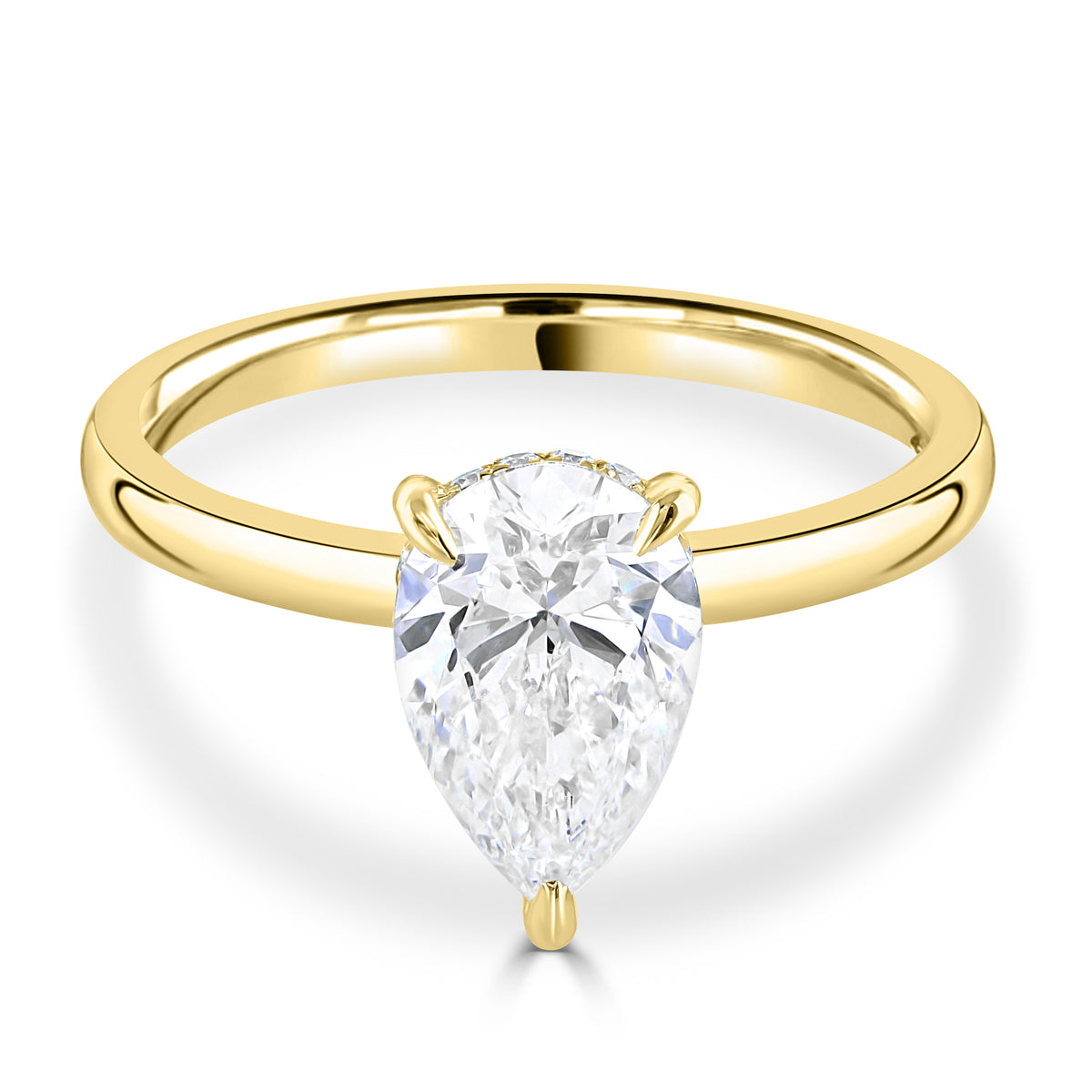 Pear Diamond set in a hidden halo 18k gold band