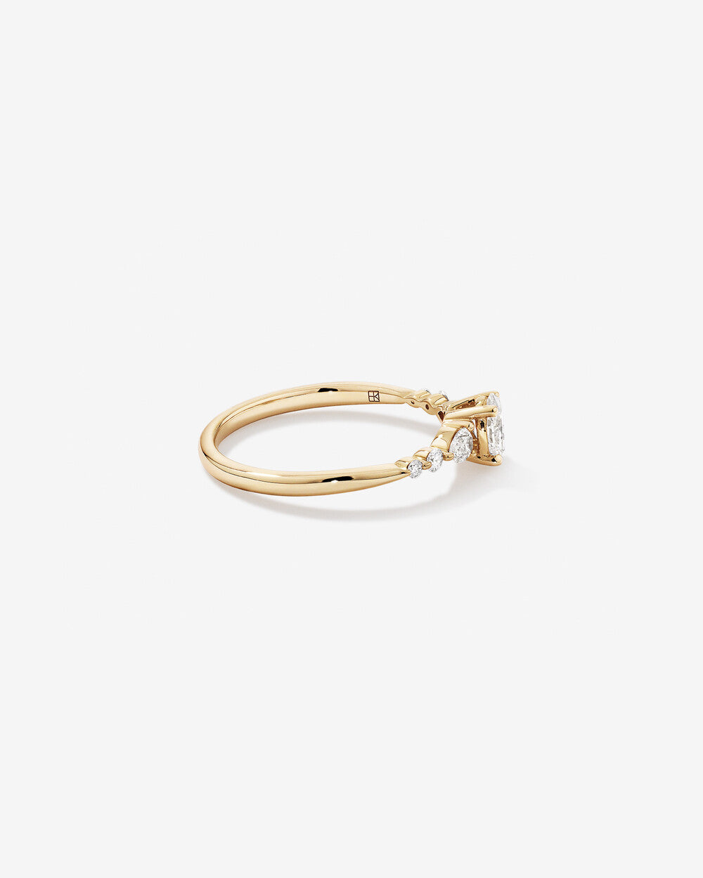 1.4 Carat Oval and Pear Sidestone Engagement Ring in 14kt Yellow Gold