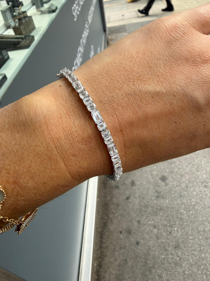 Lab-grown emerald-cut diamond tennis bracelet in 9ct white gold, worn