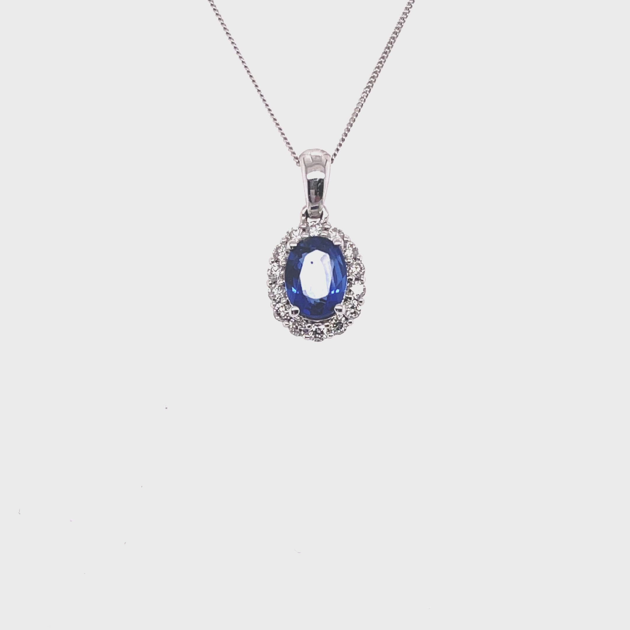 Sapphire Pendant with a Diamond Halo